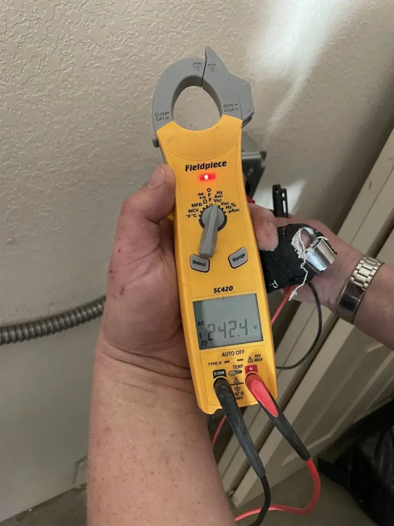 Voltage testing with clamp meter during Circuit Breaker Repair in Rockingham